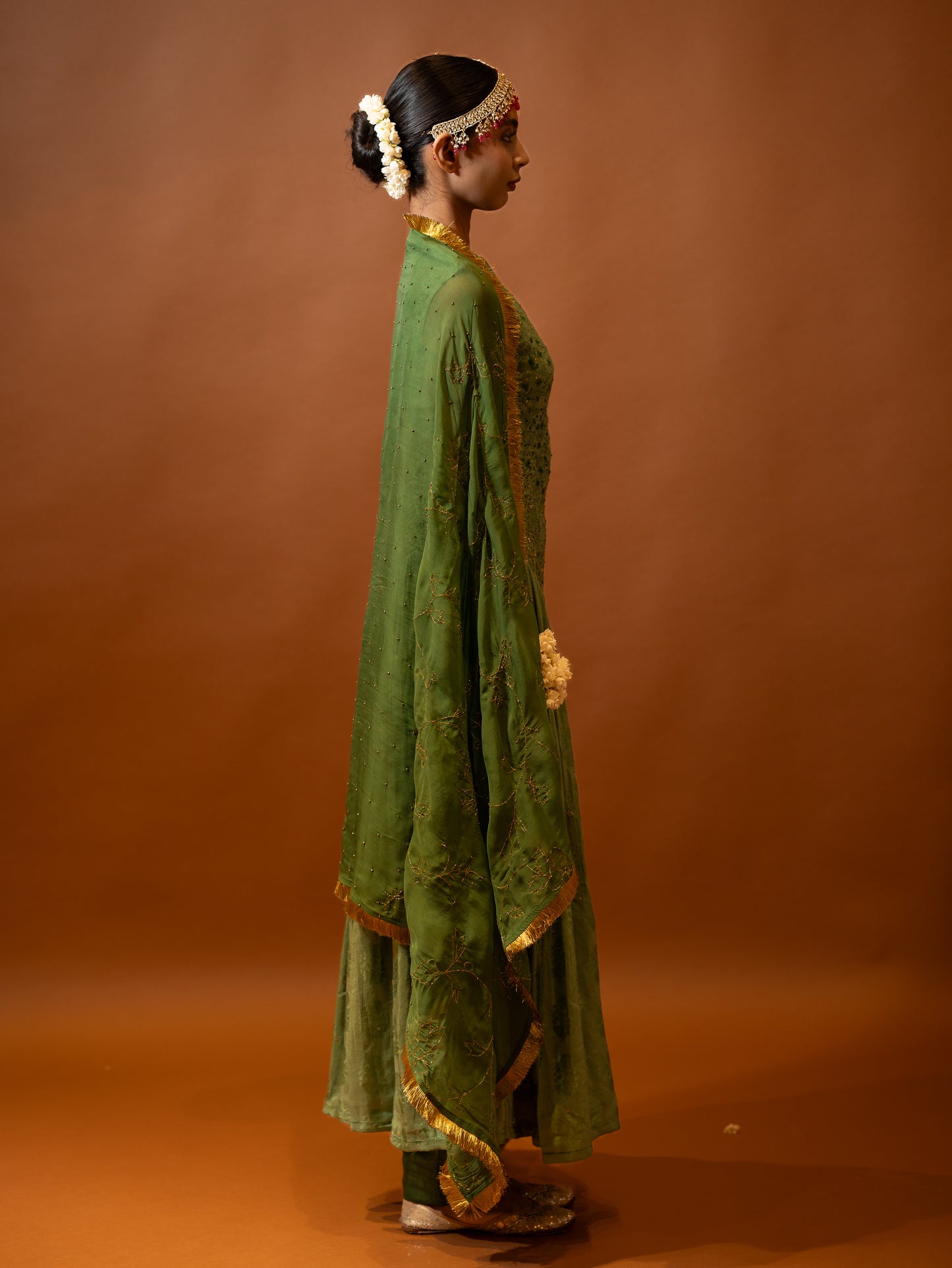 "Verdure" - Green embroidered contemporary anarkali set.
